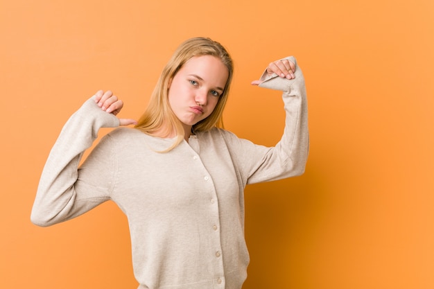 Cute and natural teenager woman feels proud and self confident, example to follow