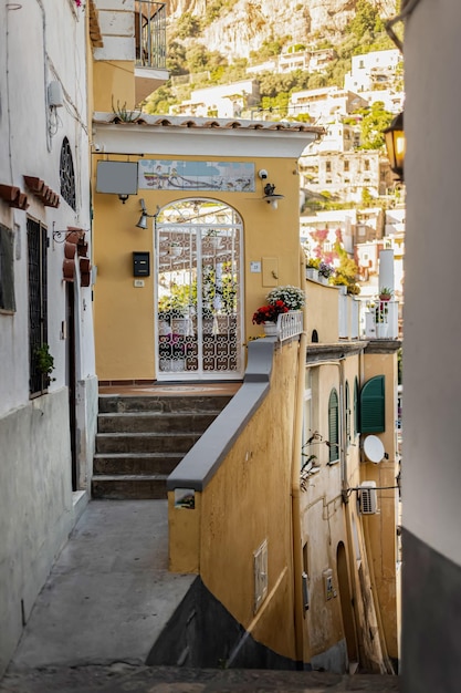 Cute old stony narrow streets with vintage houses in the village of Positano in southern Italy