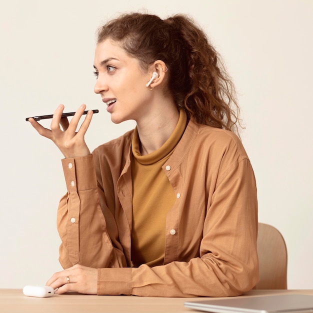 Photo cute person using air pods headphones