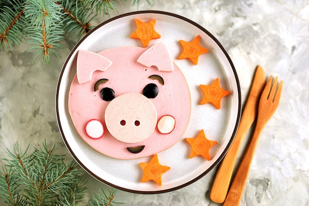 Cute pig food art idea for children's breakfast. Top view