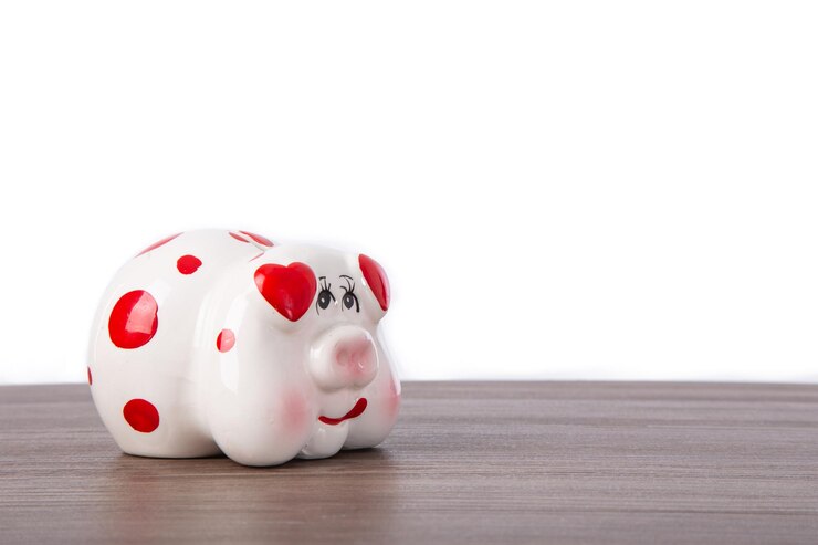 Photo cute piggy bank on wooden table