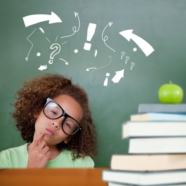 Photo cute pupil thinking against green apple on pile of books