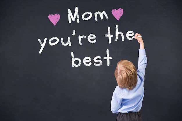 Photo cute pupil writing against black background