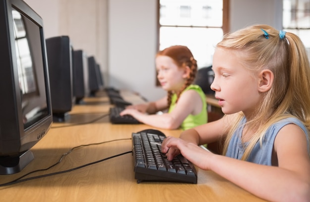 Cute pupils in computer class 