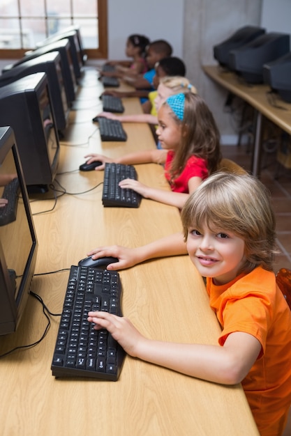 Cute pupils in computer class