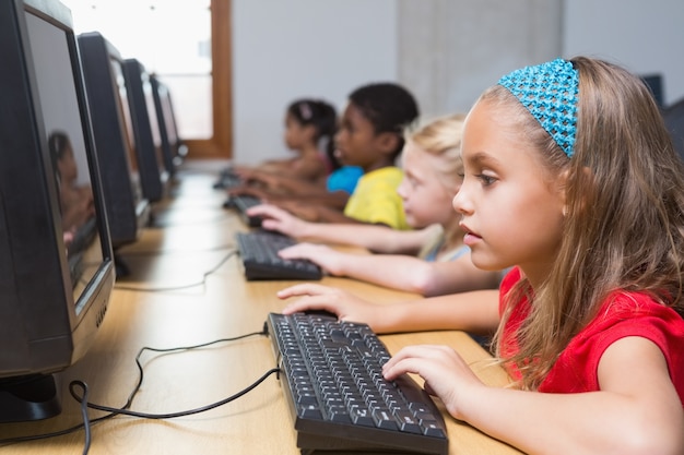 Cute pupils in computer class