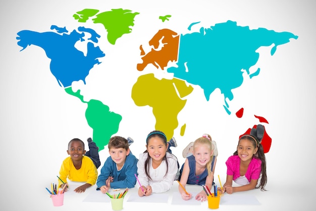 Cute pupils smiling at camera against white background with vignette with world map