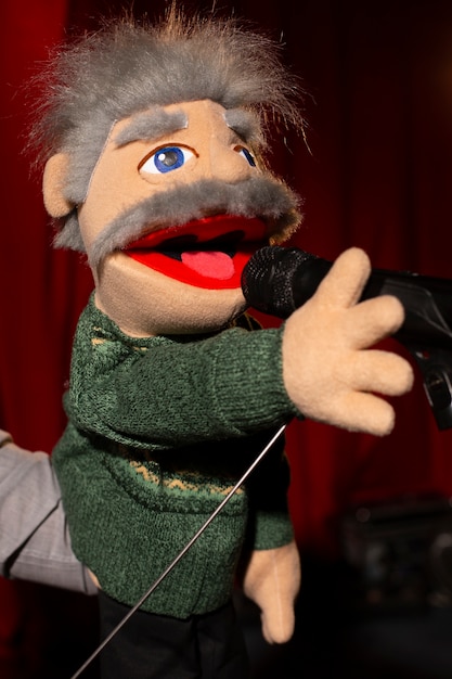 Photo cute puppet ventriloquism show