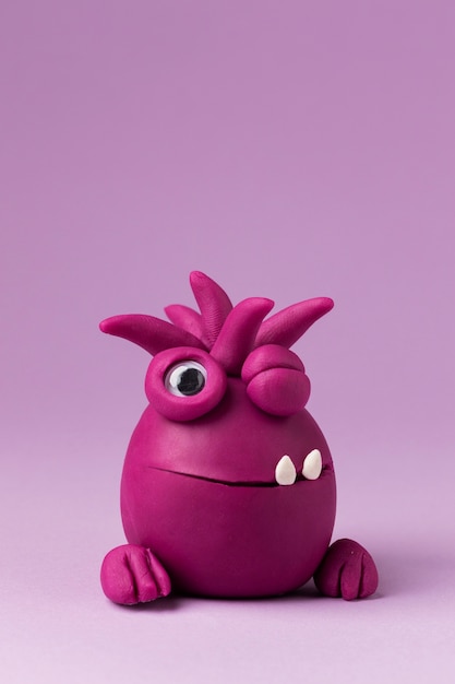 Photo cute purple play dough monster