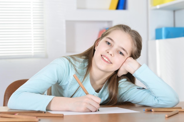 Cute schoolgirl drawing