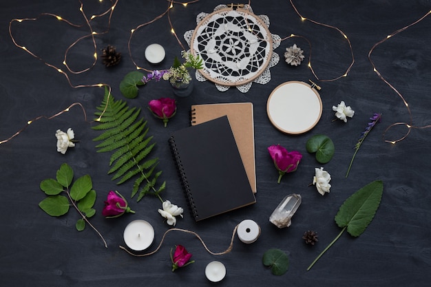 Cute and stylish branding mockup with wild flowers. Flat lay top view photo of a feminine layout.