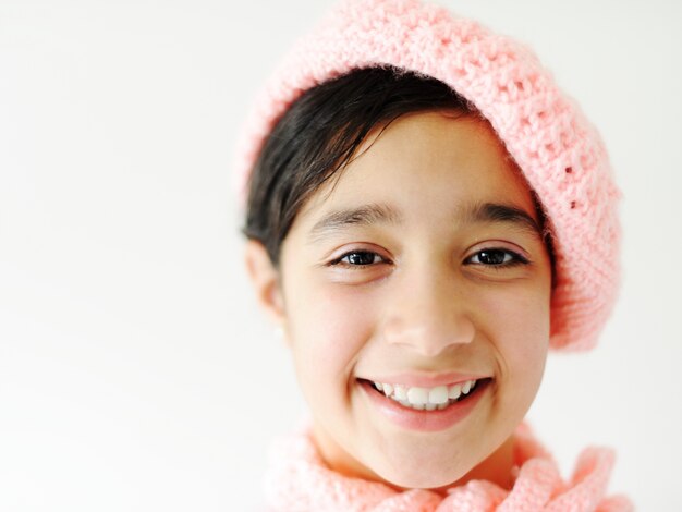 Cute teen girl with pink hat