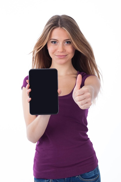 Photo cute woman showing an electronic tablet and having a positive gesture