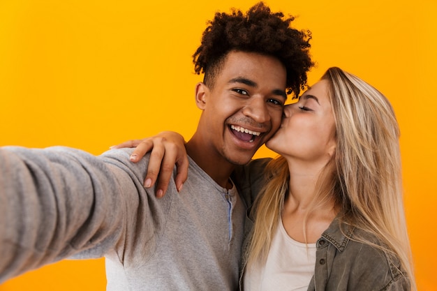 Portrait of happy couple pose for selfie together - Stock Photo [73784372]  - PIXTA