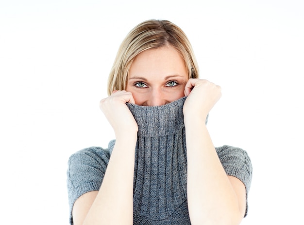 Cute young woman wearing a polo-neck sweater