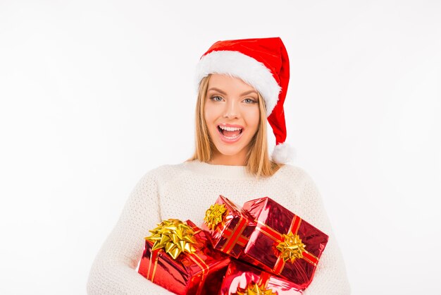 Cute young woman with a Santa hat