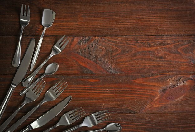 Cutlery set on wooden table