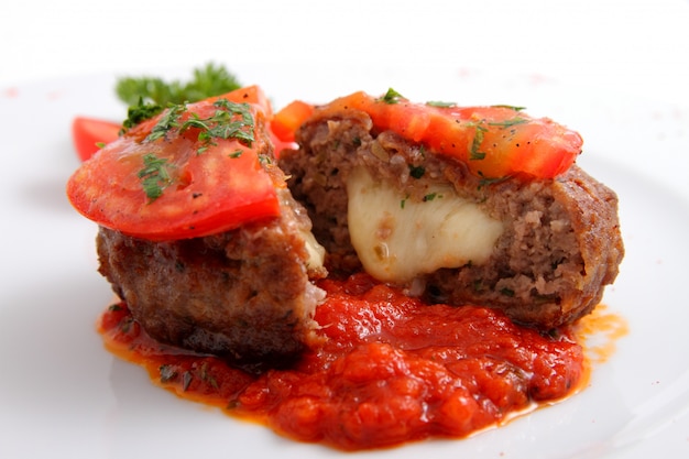 cutlet with cheese and tomatoes