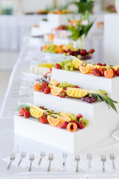 Cutted fruits on buffet table