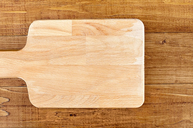 cutting board closeup on a wooden table View from above