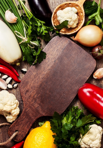 Photo cutting board and fresh vegetables