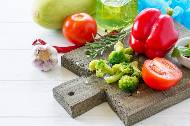 Cutting board and fresh vegetables