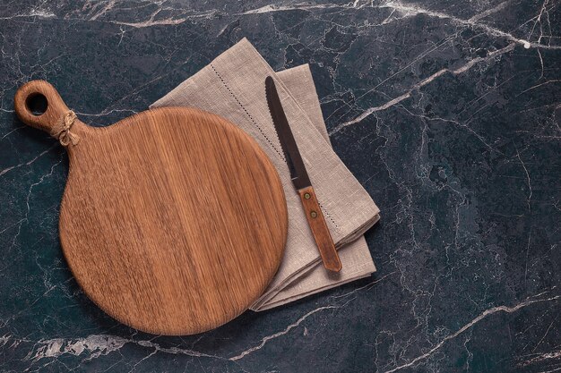 cutting board on a marble table, top view