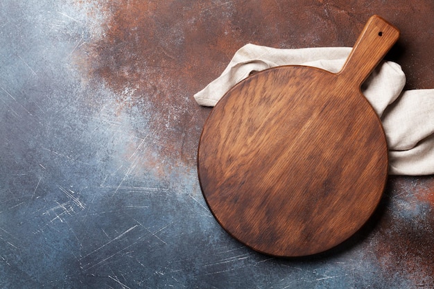 Cutting board over metal table