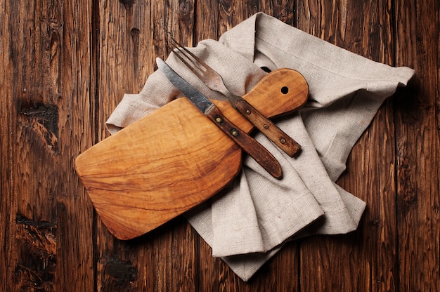 Cutting board on the vintage wooden table