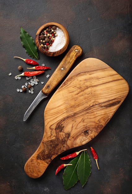 Cutting board with herbs and spices. Culinary background