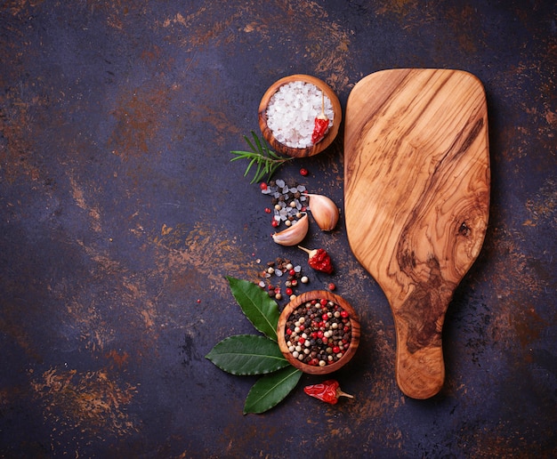 Cutting board with herbs and spices.