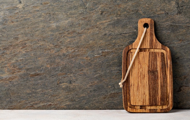 Cutting board on wooden kitchen table