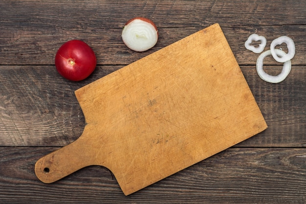 Cutting board on wooden table