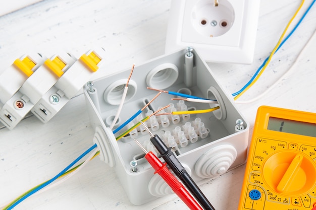 Cutting box, digital multimeter, circuit breakers and installation of power supply systems