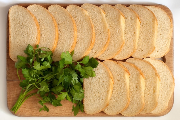 Cutting bread on a board