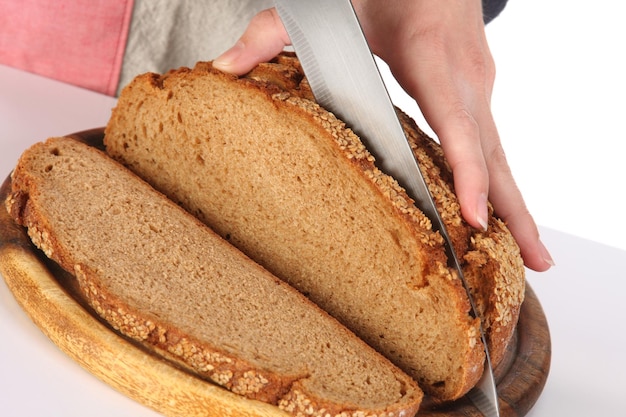 Cutting bread with knife