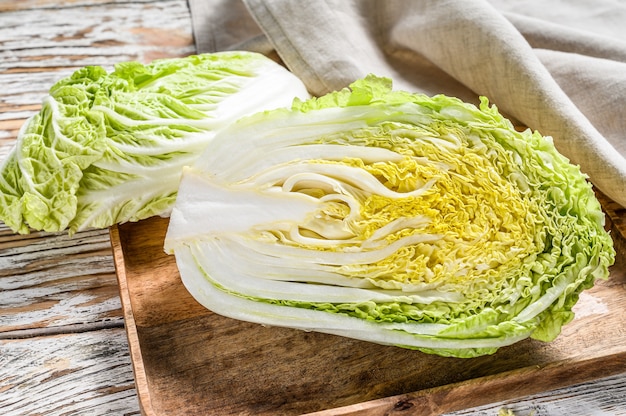 Cutting Chinese cabbage on table