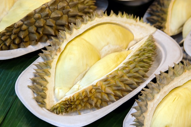 cutting durian fruits on ackage