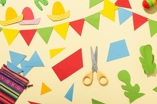 Cutting paper flags for the Mexican holiday
