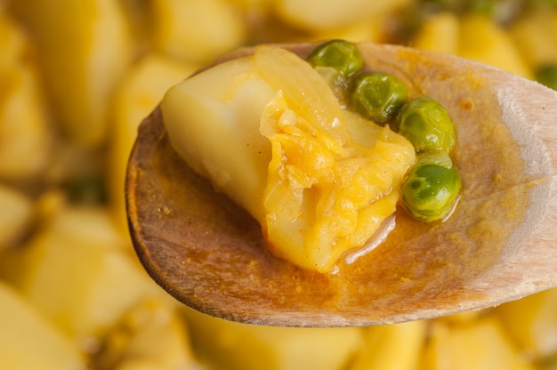 Cuttlefish stew with potatoes and peas