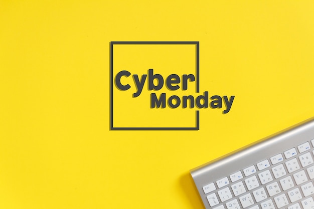 Cyber monday text sales day with yellow paper background