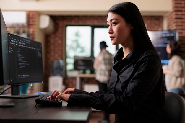 Cyber officer encrypting big chunks of data in order to secure important files. Software developer engineering an autonomous defence system using advanced artificial intelligence technology.