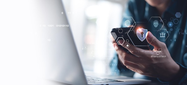 cyber security data protection concept user using mobile phone and laptop computer with privacy security and data encryption system secure internet access cybersecurity software technology