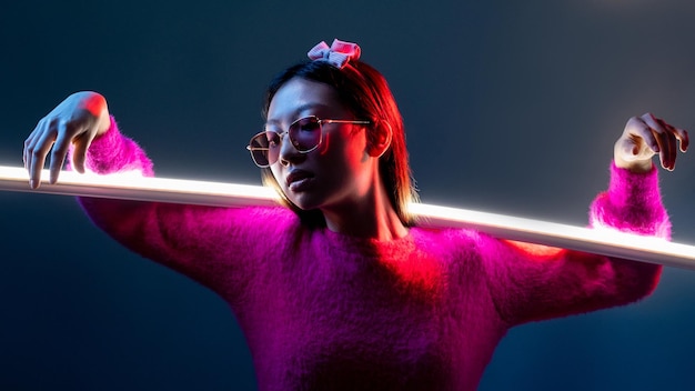 Cyberpunk fashion neon light people girl in pink