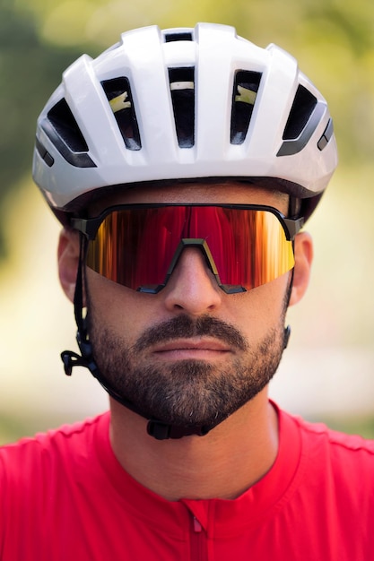 Cyclist looking at camera with a defiant attitude