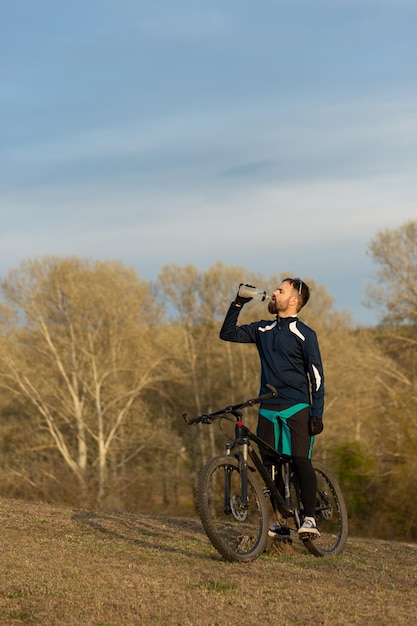 Cyclist rides through the woods