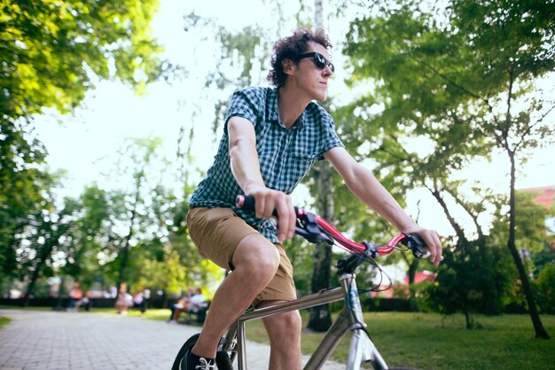 Cyclist riding in a city park