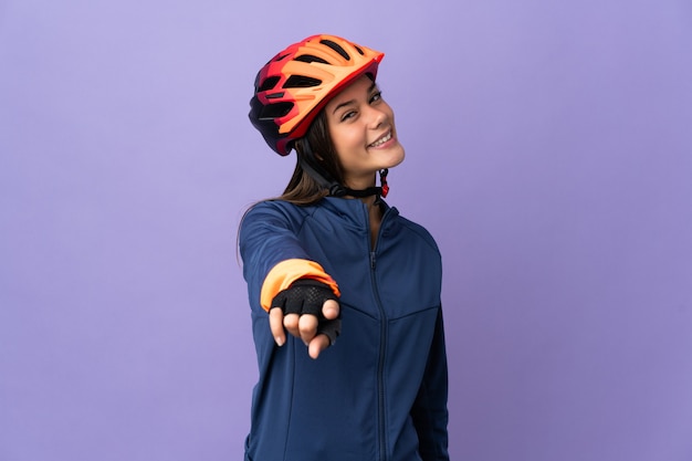 cyclist woman pointing front with happy expression