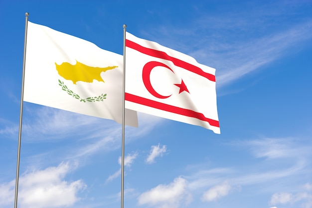 Фото Флаги кипра и турецкой республики северного кипра на фоне голубого неба. 3d иллюстрации