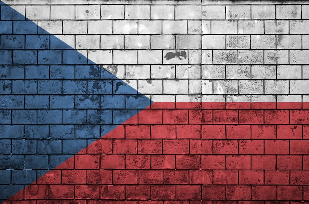 Czech flag is painted onto an old brick wall